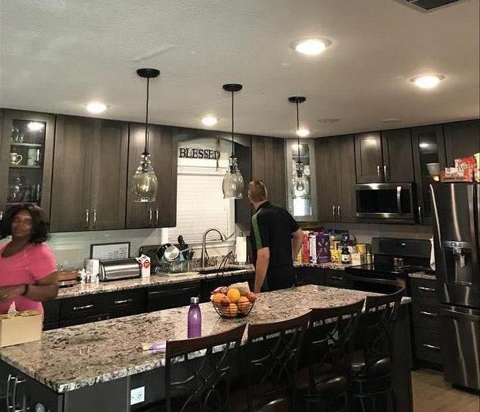 Renovated kitchen after fire in Callaway, FL