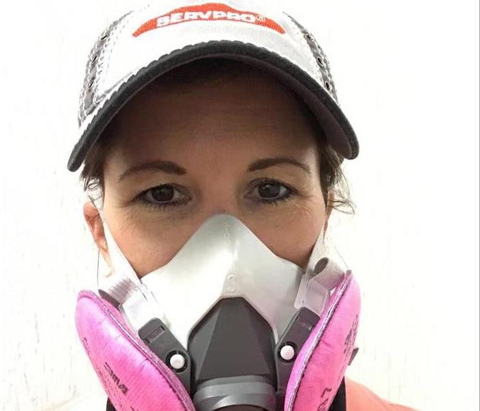 Servpro employee wearing PPE equipment