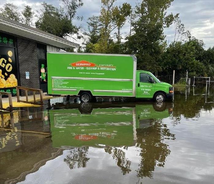 SERVPRO truck in front of a flooded commercial building in Callaway, Florida