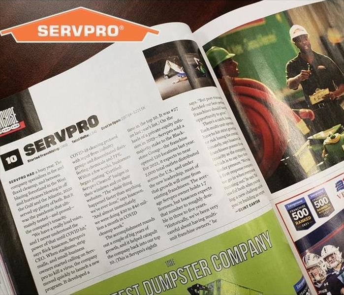 Magazine Article featuring SERVPRO on Wooden table