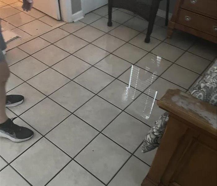 Puddled water from flooding damage in a residential property