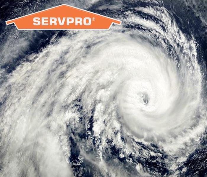 Satellite image of a Hurricane with SERVPRO logo